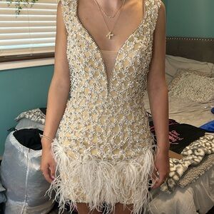 Homecoming dress- size 4 altered by dress store owner to size 0-00. Worn once.